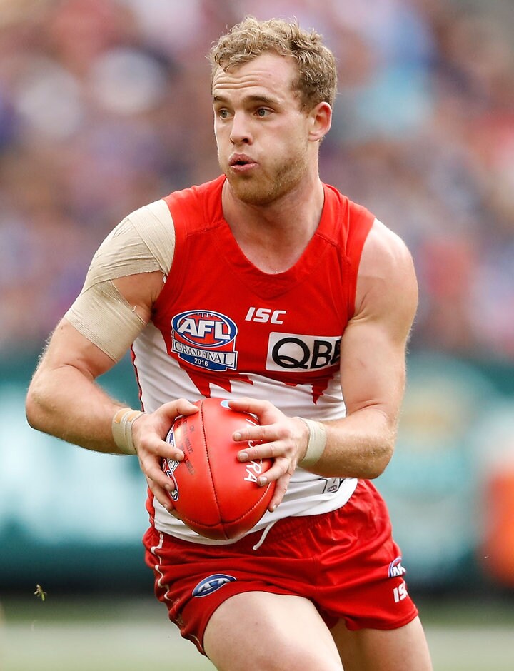 AFL 2016 Toyota AFL Grand Final - Sydney v Western Bulldogs MELBOURNE, AUSTRALIA - OCTOBER 01: Tom Mitchell of the Swans in action during the 2016 Toyota AFL Grand Final match between the Sydney Swans and the Western Bulldogs at the Melbourne Cricket Ground on October 01, 2016 in Melbourne, Australia. (Photo by Adam Trafford/AFL Media)